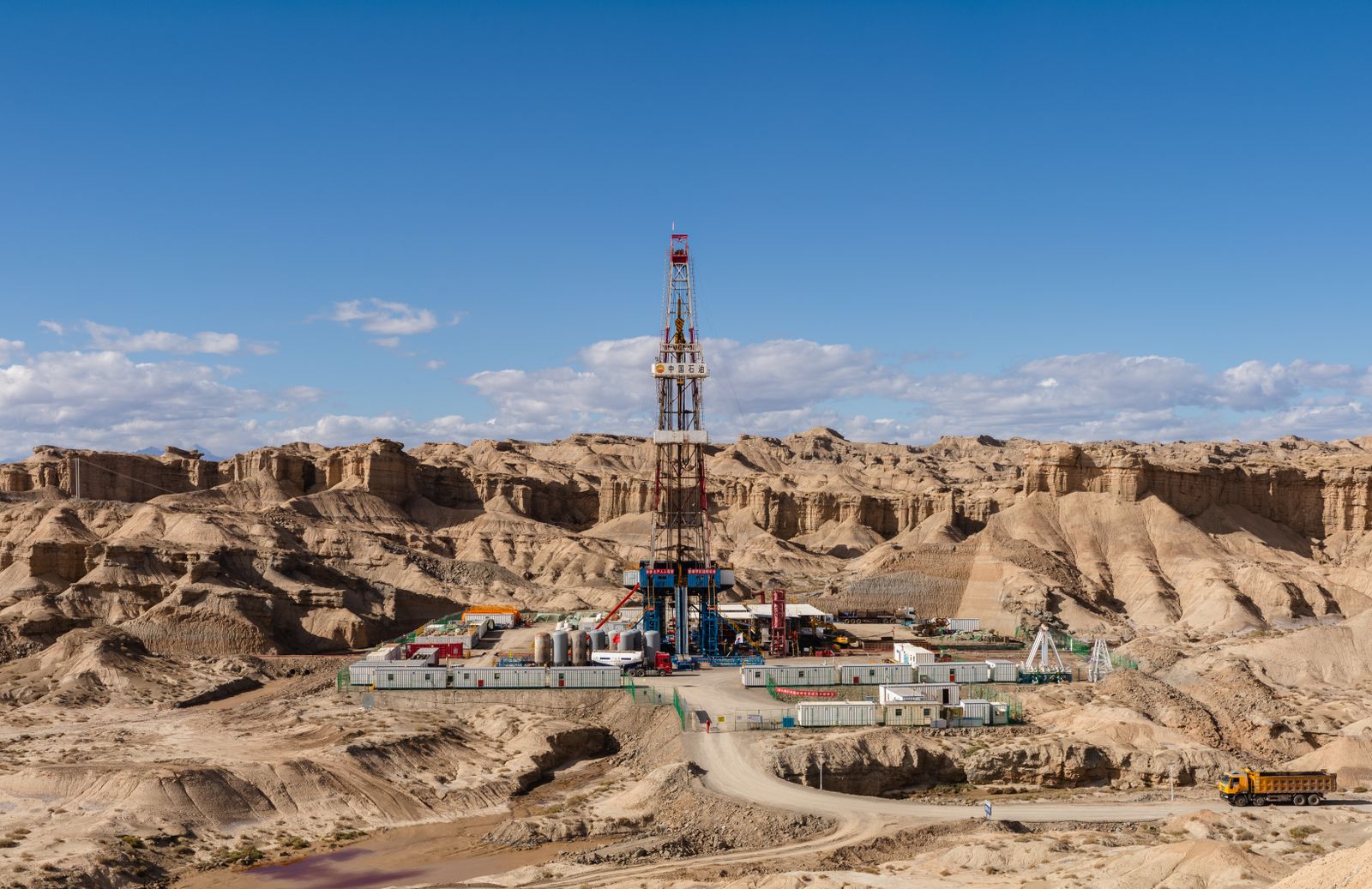 Land drilling rig in a desert landscape