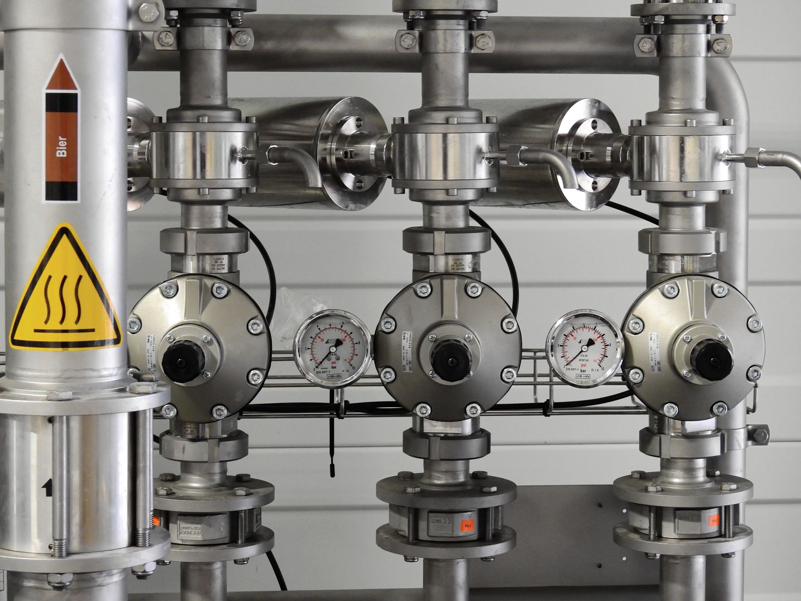 Engineered skid with regulators and pressure gauges