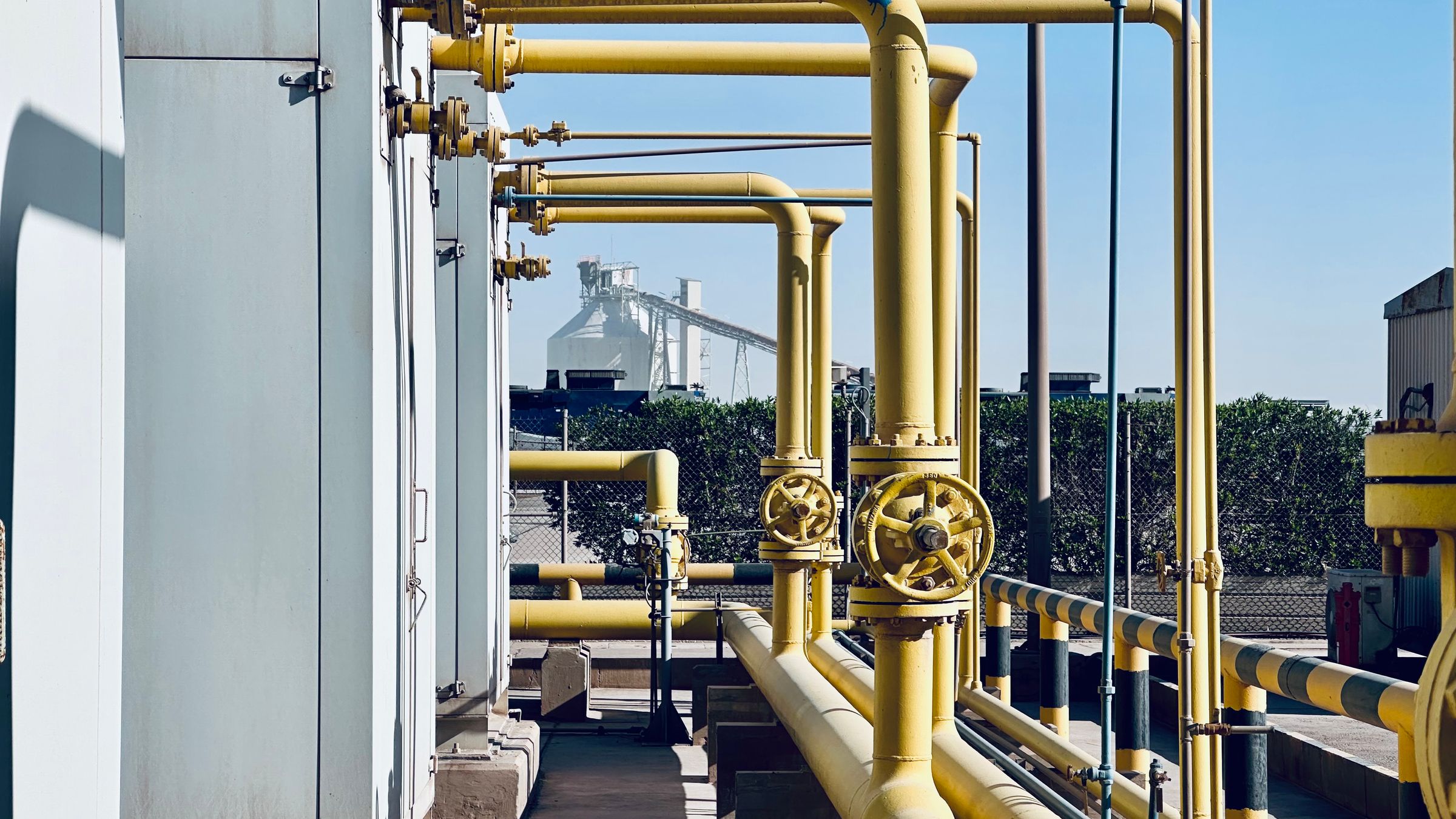 Production piping and valves at a gas facility